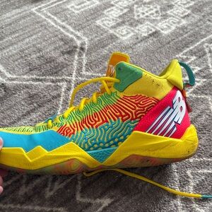 New Balance Kids Yellow, Red, and Blue Sneakers